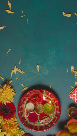 Still-Life-Rakhi-Scene-With-Thali-Holding-Sindoor-and-Rice,-Vertical